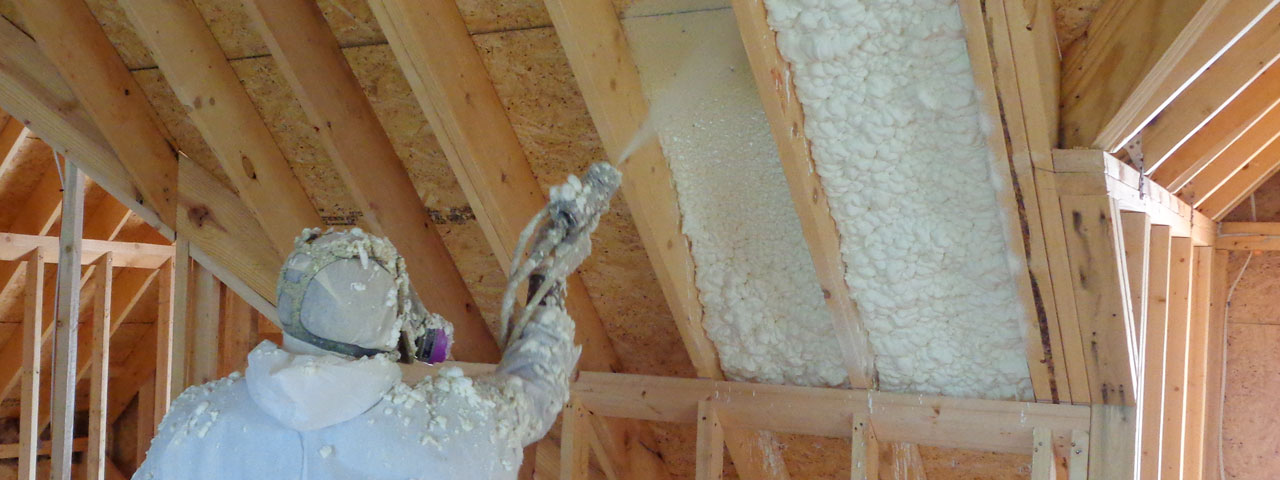 Spray foam attic insulation being applied in a Kansas City home